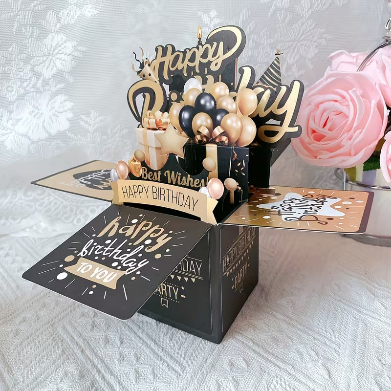 3D pop-up születésnapi kártya oldalról nézve rózsaszín rózsával a háttérben — fekete-arany elegáns kivitel