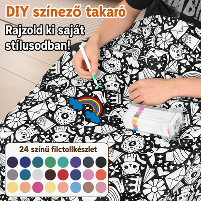 Kéz textilfilccel színezi a takaró rajzait, mellette a 24 színes filc tokban